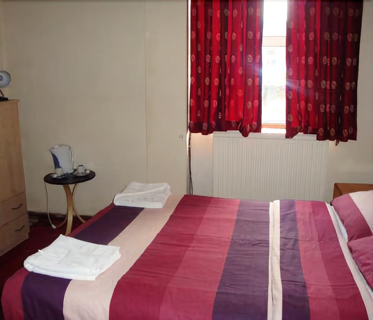 Imagen de la habitación del Hotel London Shelton. Foto 2