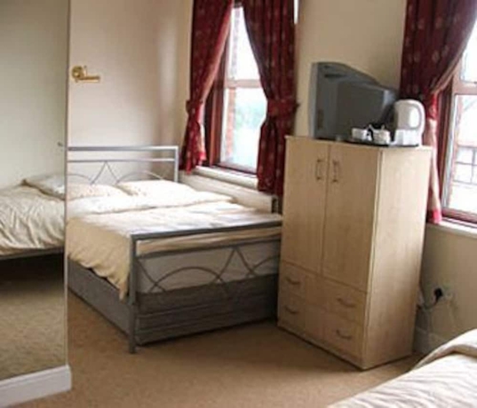 Imagen de la habitación del Hotel London Shelton. Foto 3