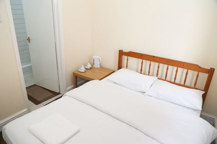 Imagen de la habitación del Hotel London Shelton. Foto 10