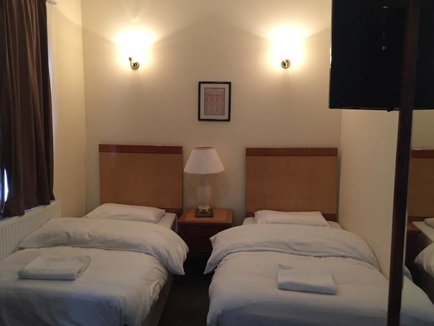 Imagen de la habitación del Hotel London Shelton. Foto 12