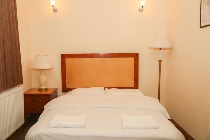 Imagen de la habitación del Hotel London Shelton. Foto 16