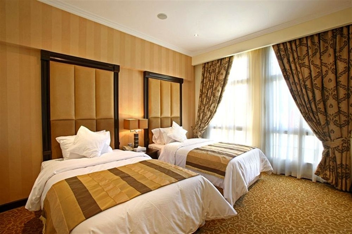 Imagen de la habitación del Hotel London Suites. Foto 7