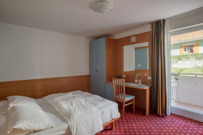 Imagen de la habitación del Hotel Londra, Molveno. Foto 13