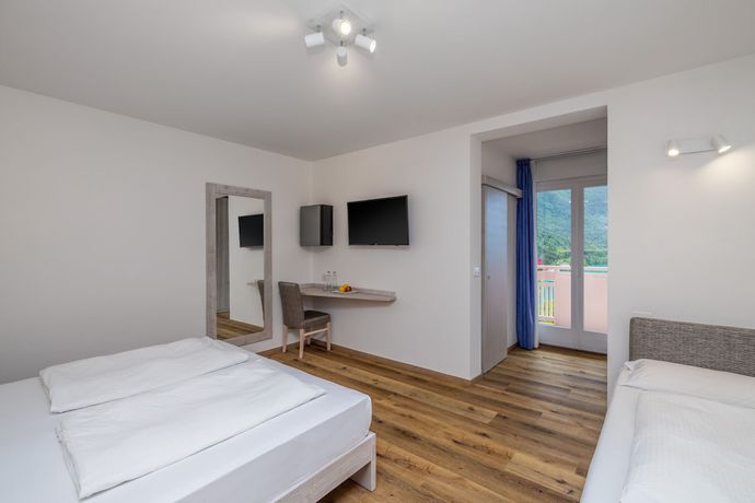 Imagen de la habitación del Hotel Londra, Molveno. Foto 16