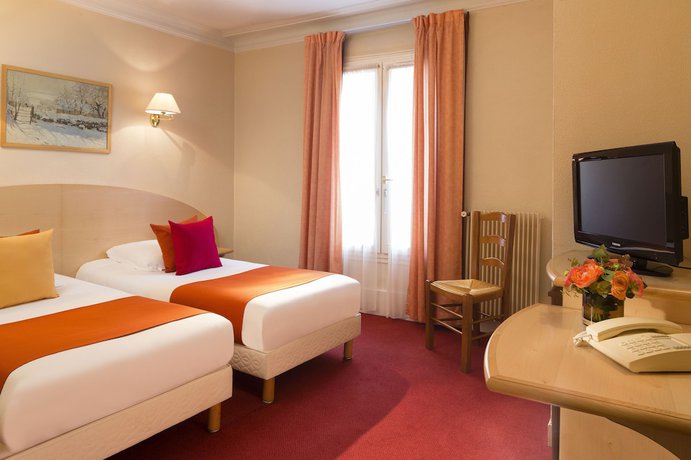 Imagen de la habitación del Hotel Londres Saint-Honoré. Foto 11