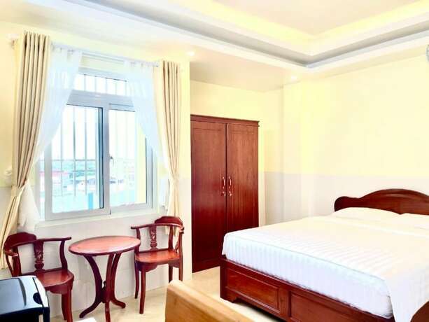 Imagen de la habitación del Hotel Long Ha. Foto 17
