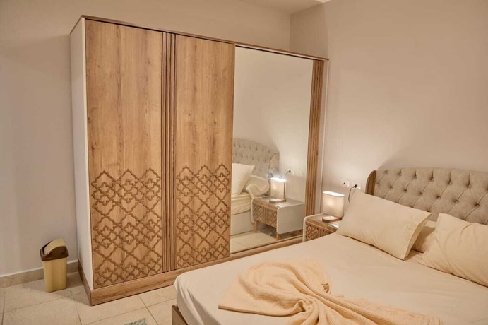 Imagen de la habitación del Hotel Long Island Chalets Family only. Foto 3