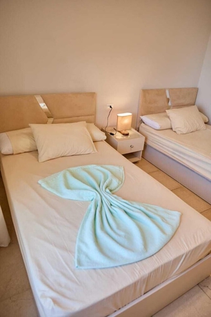Imagen de la habitación del Hotel Long Island Chalets Family only. Foto 6