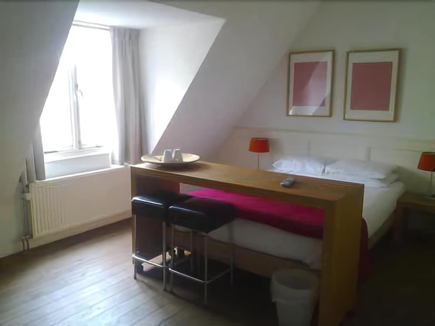 Imagen de la habitación del Hotel Long John's. Foto 3