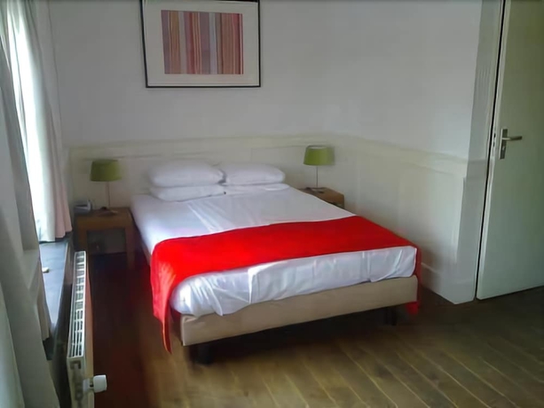 Imagen de la habitación del Hotel Long John's. Foto 12