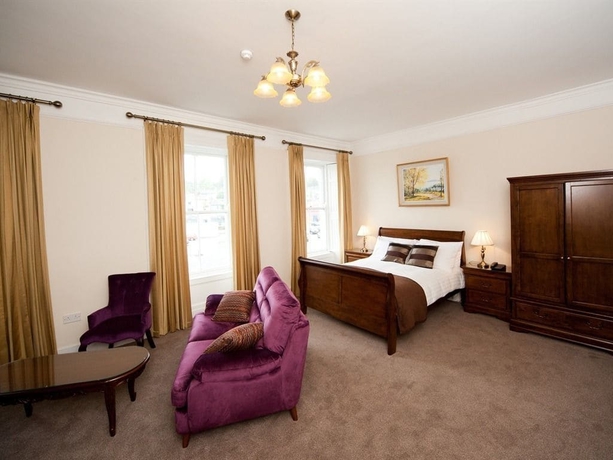 Imagen de la habitación del Hotel Long Quay House. Foto 6