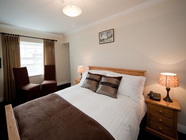 Imagen de la habitación del Hotel Long Quay House. Foto 8