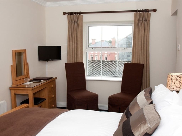 Imagen de la habitación del Hotel Long Quay House. Foto 13