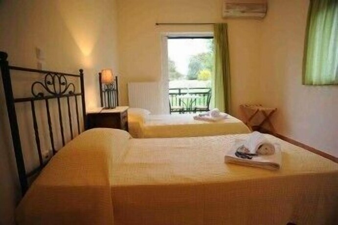 Imagen de la habitación del Hotel Long View Resort and Spa Rooms and Apartments. Foto 19