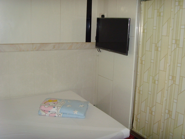 Imagen de la habitación del Hotel Long Yuen. Foto 2