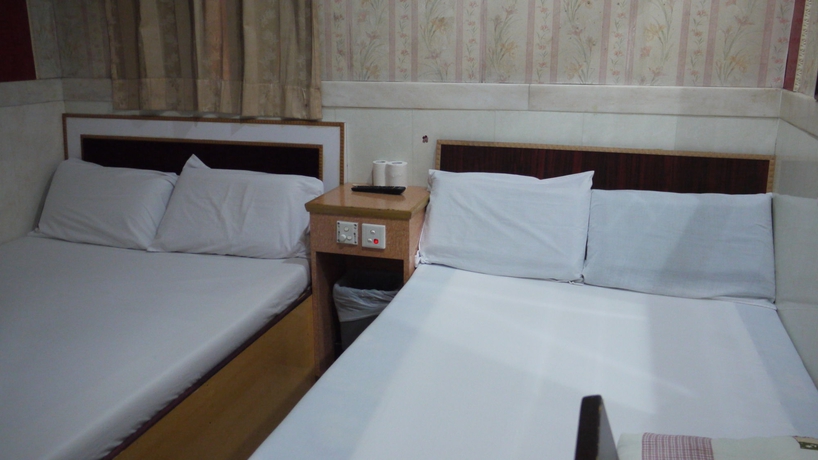 Imagen de la habitación del Hotel Long Yuen. Foto 5