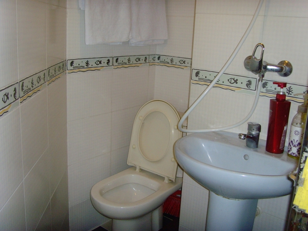 Imagen de la habitación del Hotel Long Yuen. Foto 7