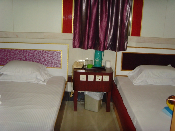 Imagen de la habitación del Hotel Long Yuen. Foto 10