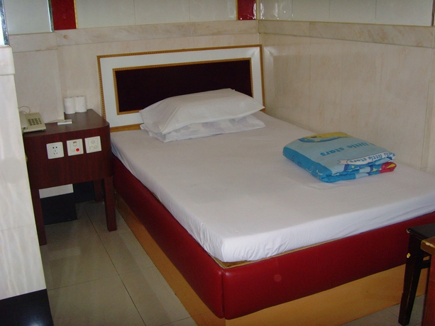 Imagen de la habitación del Hotel Long Yuen. Foto 11