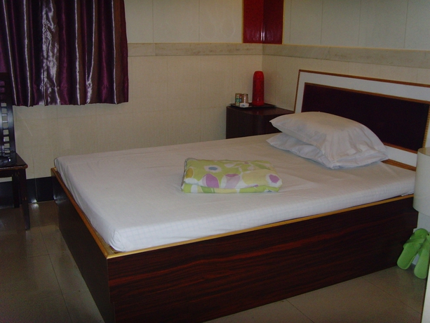 Imagen de la habitación del Hotel Long Yuen. Foto 13