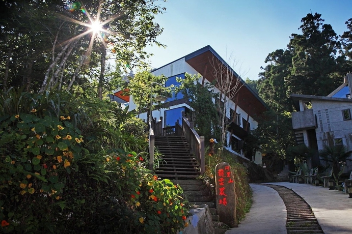 Imagen de los exteriores del Hotel Long Yun Farm. Foto 13