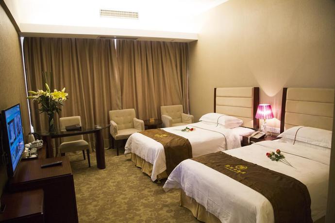 Imagen de la habitación del Hotel Long Zhou. Foto 5