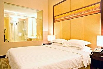 Imagen de la habitación del Hotel Long Zhou. Foto 9