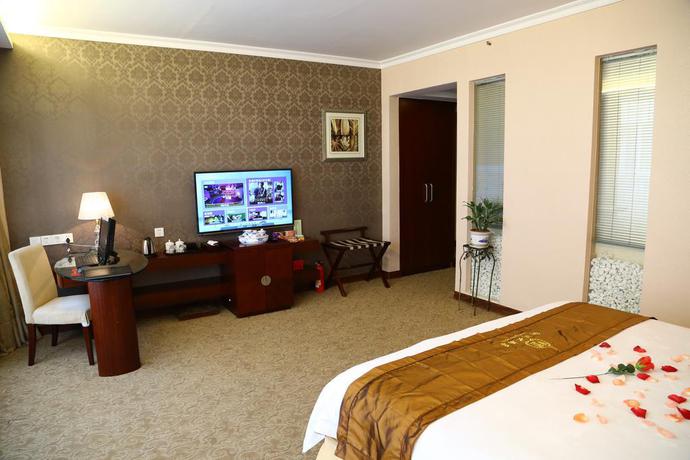 Imagen de la habitación del Hotel Long Zhou. Foto 14
