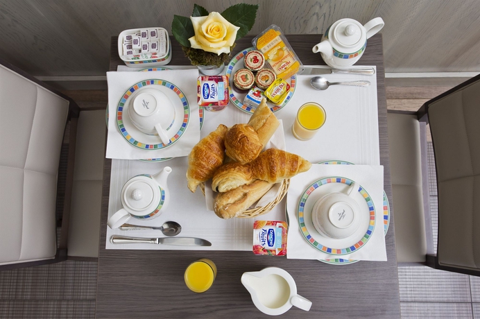 Imagen del bar/restaurante del Hotel Longchamp Elysees. Foto 4