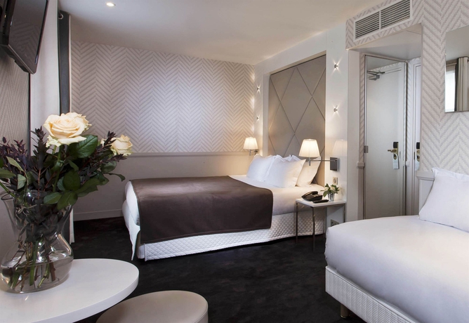 Imagen de la habitación del Hotel Longchamp Elysees. Foto 11