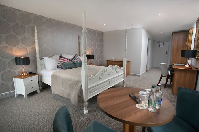 Imagen de la habitación del Hotel Longcourt House. Foto 19