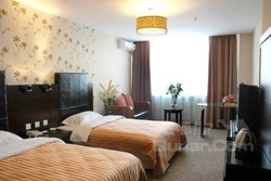 Imagen de la habitación del Hotel Longda Times Hotel. Foto 4