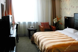 Imagen de la habitación del Hotel Longda Times Hotel. Foto 5