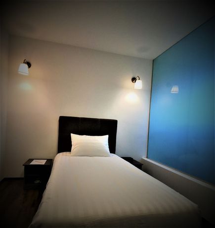 Imagen de la habitación del Hotel Longhouse. Foto 13