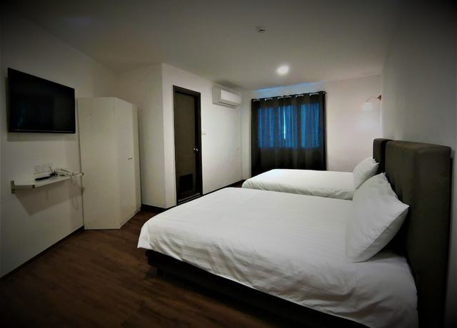 Imagen de la habitación del Hotel Longhouse. Foto 15