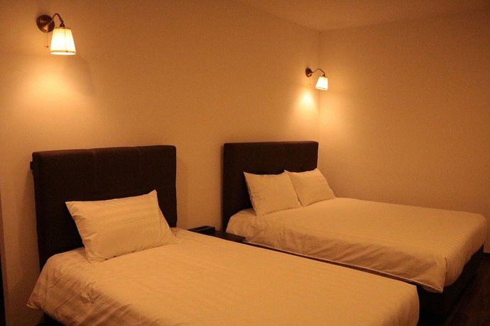 Imagen de la habitación del Hotel Longhouse. Foto 16