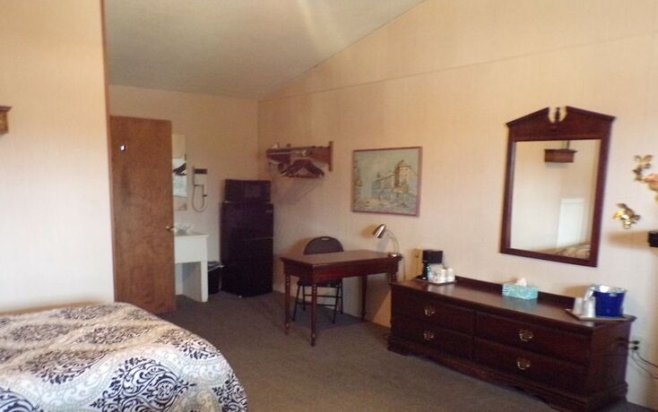 Imagen de la habitación del Hotel Longhouse Lodge Motel. Foto 18