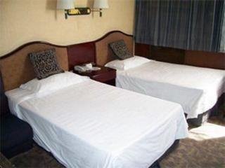 Imagen de la habitación del Hotel Longhu Hotspring. Foto 2