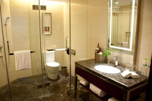 Imagen de la habitación del Hotel Longhua International. Foto 7