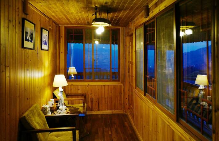 Imagen de la habitación del Hotel Longji One Art Inn. Foto 11