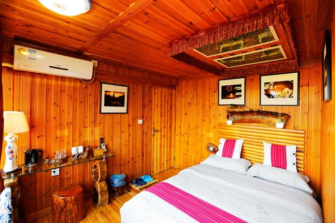 Imagen de la habitación del Hotel Longji One Art Inn. Foto 13