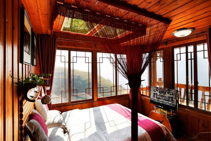 Imagen de la habitación del Hotel Longji One Art Inn. Foto 18