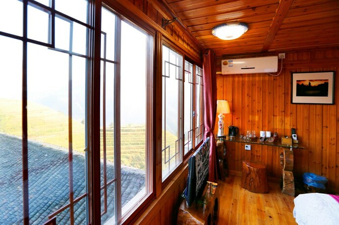 Imagen de la habitación del Hotel Longji One Art Inn. Foto 26