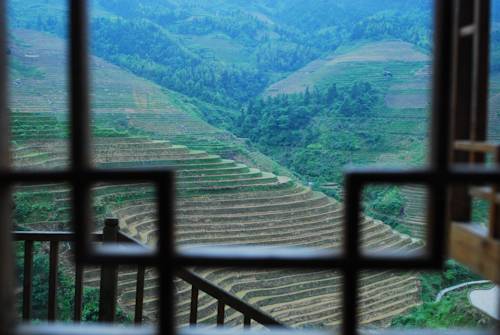 Imagen de la habitación del Hotel Longji Rice Terraces Tian Ranju Inn. Foto 1