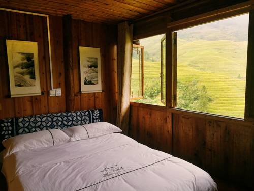 Imagen de la habitación del Hotel Longji Rice Terraces Tian Ranju Inn. Foto 2