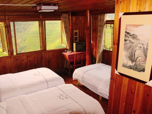 Imagen de la habitación del Hotel Longji Rice Terraces Tian Ranju Inn. Foto 4