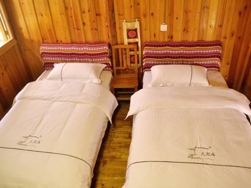 Imagen de la habitación del Hotel Longji Rice Terraces Tian Ranju Inn. Foto 6