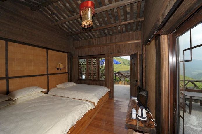 Imagen de la habitación del Hotel Longji Star Wish Resort. Foto 6