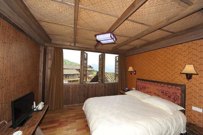 Imagen de la habitación del Hotel Longji Star Wish Resort. Foto 8