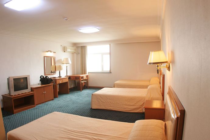 Imagen de la habitación del Hotel Longjing Lihua International Hotel And Spa. Foto 8